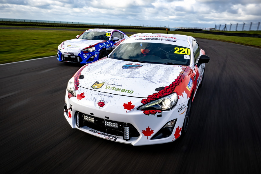 Two race cars on a track.